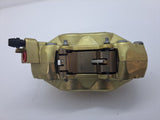 Left Gold Brembo Brake Caliper